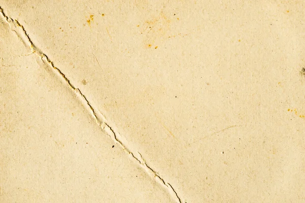 Old paper background  with crack — Stock Photo, Image