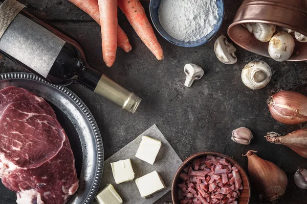 Ingredients for Boeuf Bourguignon on the old metal background top view — Stock Image Ingredients for Boeuf Bourguignon on the old metal background top view Royalty Free Stock Photos
