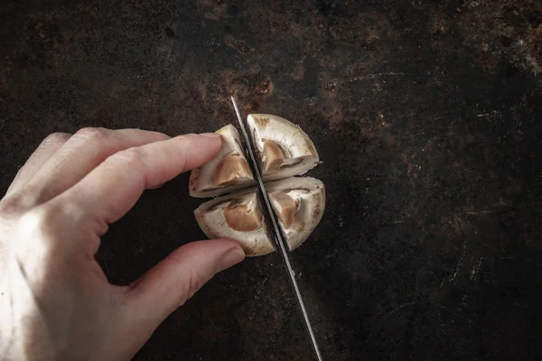 Cutting mushroom on the old metal background top view — Stock Photo, Image