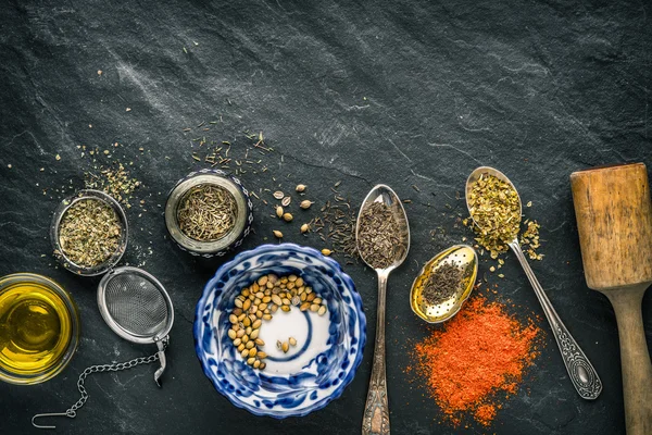 Spices for Giros in vessels on a black slate — Stock Photo, Image