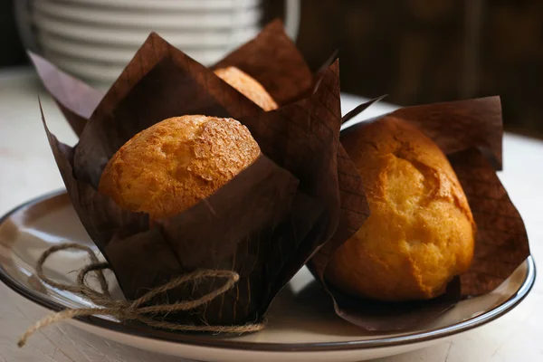 Three muffins on the plate — Stock Photo, Image