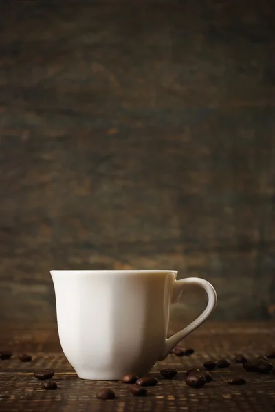 White porcelain coffee cup on the wooden table — Stock Photo, Image