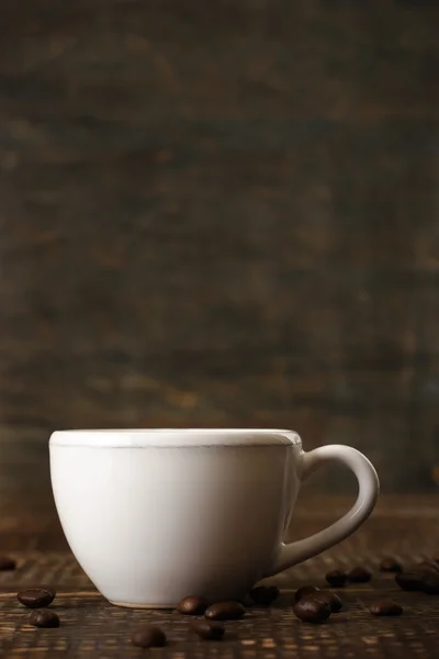 White ceramic coffee cup on the wooden table — Stock Photo, Image