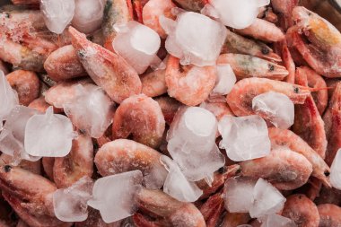Frozen shrimps close-up background