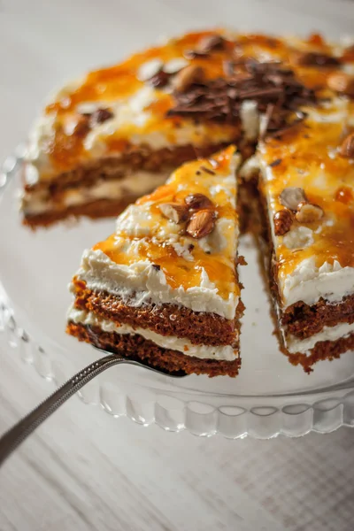 Carrot cake with almond and chocolate chips vertical — Stock Photo, Image