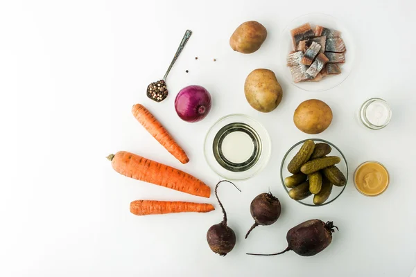 Ingredients for vegetable salad with beet and herring top view — Stock Image Ingredients for vegetable salad with beet and herring top view Royalty Free Stock Photos
