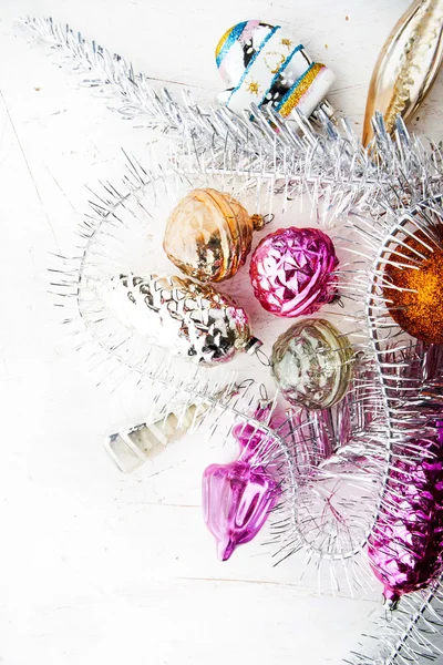 Christmas decorations on the white table vertical — Stock Photo, Image