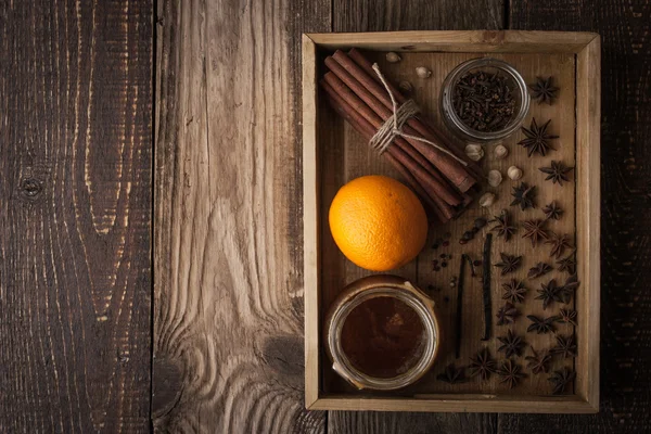 Orange, honey and spices on the wooden tray horizontal — стоковое фото