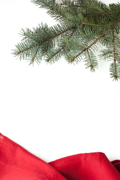 Fir tree with red scarf on the white background vertical — Stock Photo, Image