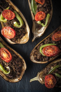 Eggplants with minced meat and vegetables top view