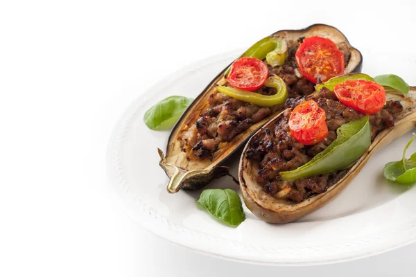 Eggplant with minced meat and vegetables on the white background horizontal — 图库照片