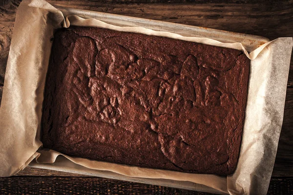 Chocolate brownie on the baking tray — Zdjęcie stockowe