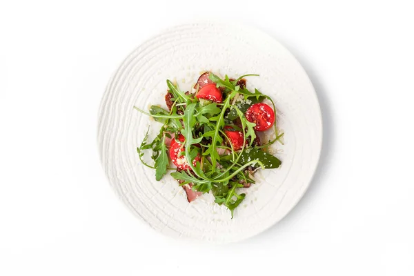 Smoked ham and arugula salad on the white background top view — Stock Photo, Image