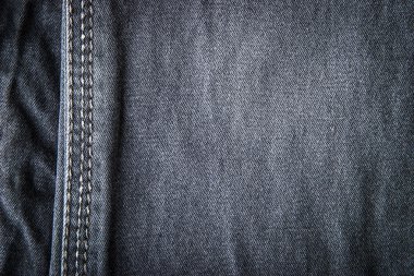 Karanlık kot dikiş arka plan ile