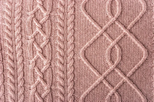 Rosa suéter figurado fondo —  Fotos de Stock