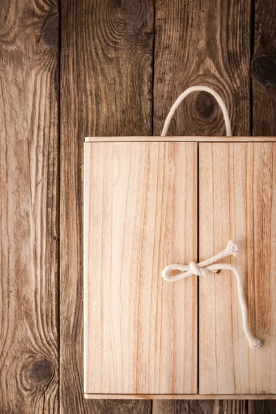 Wooden shelf with doors on the wooden background — Stock Photo, Image