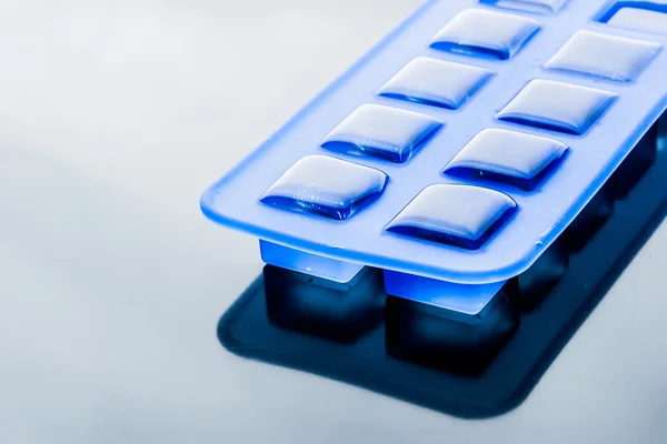 Ice cube tray with ice horizontal — Stock Photo, Image