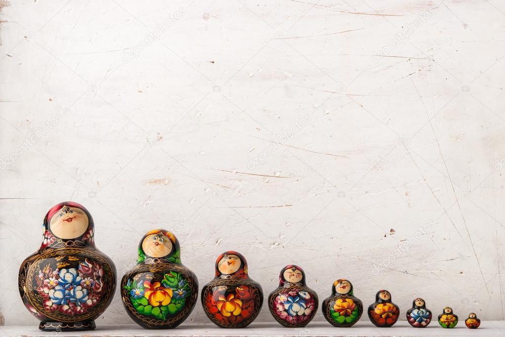 Matreshka set on the white scratched background