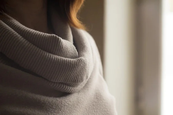 Woman in the gray sweater — Stock Photo, Image