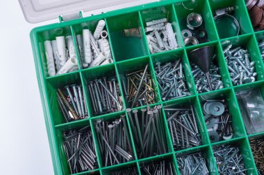 box with screws, nails, clamps in different sizes clipart