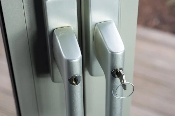 Locks at glass doors to the garden as defense for break-in — Stock Photo, Image