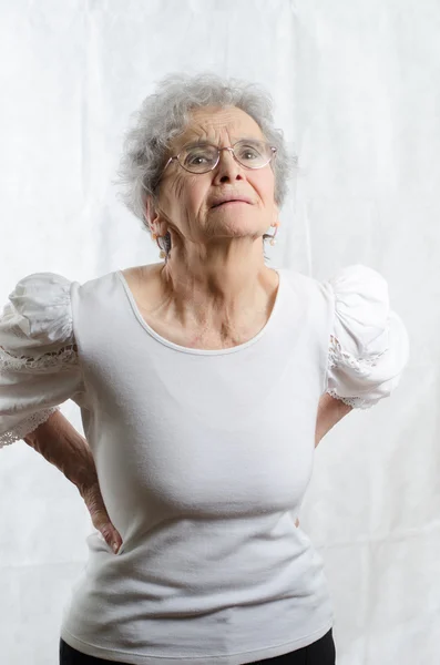 Old woman with backpain — Stock Photo, Image