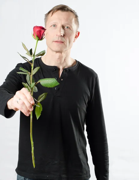 Man met rose — Stockfoto