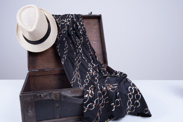 Vintage suitcase packed for a summer trip