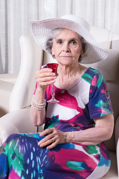 Active female senior drinking somethng — Stock Photo, Image