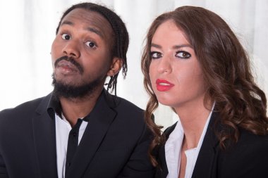 Loving couple is looking into camera