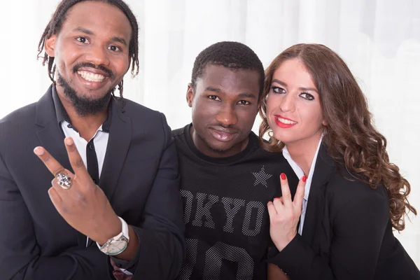 Group of two africans and one caucasian girl — Stock Photo, Image