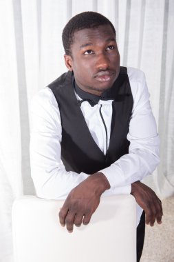 attractive african man is posing