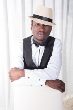 attractive african man is posing