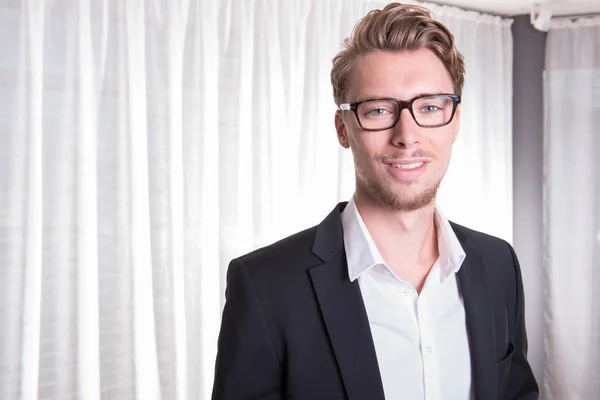 Portrait young business man in suit with glasses — Stock Photo, Image