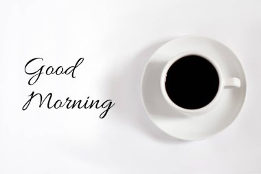 - Günaydın. Hafif arka planda bir fincan kahve. Bir fincan kahve. Pankart için fikir