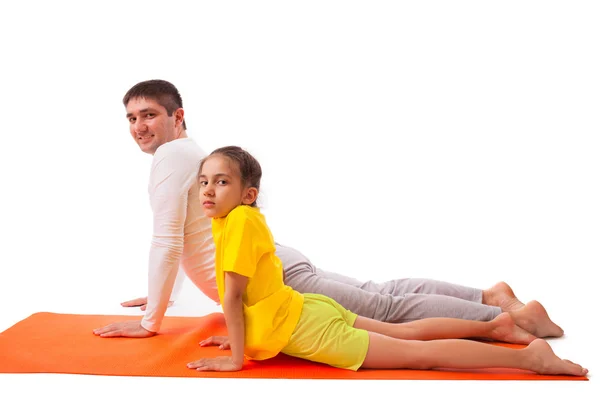 Dad practicing yoga with daughter isolated — Stock Photo, Image