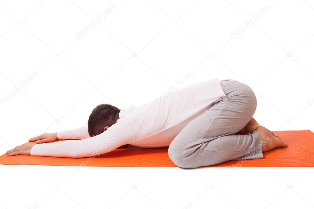 handsome man practicing yoga isolated