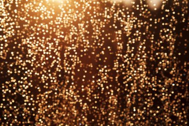 Glitter şenlikli Noel ışıkları arka plan. ışık ve altın kusur