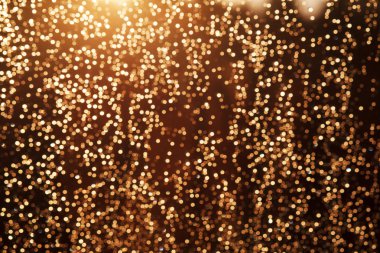Glitter festive christmas lights background. light and gold defo clipart