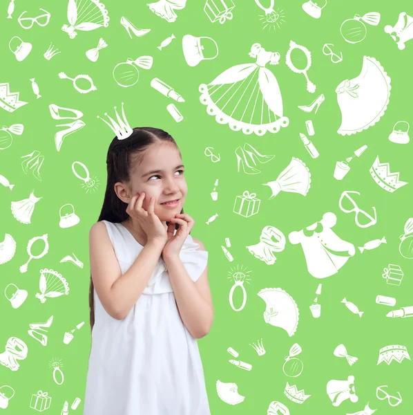 Girl kid on background of texture of girl's things — Stock Photo, Image