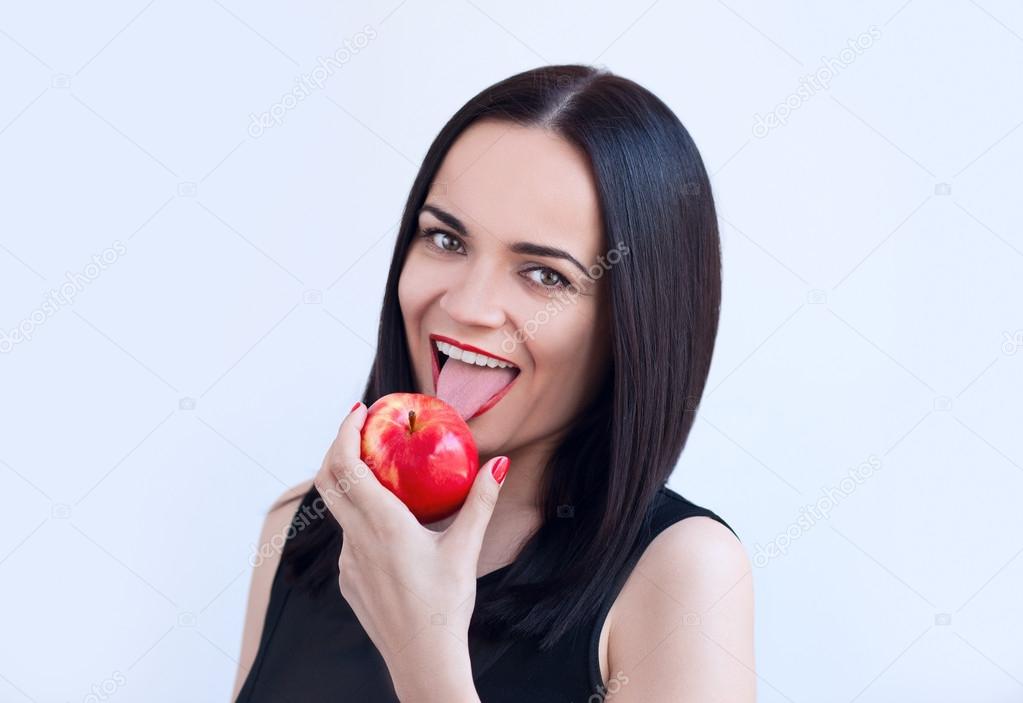 Sexy woman with apple