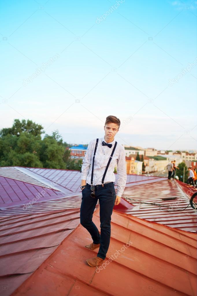 Handsome  hipster guy on the roof