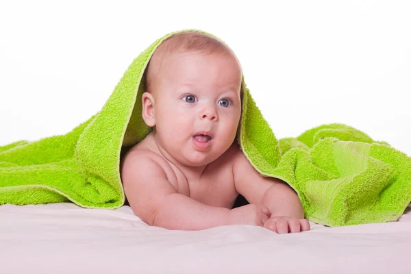 Schattige gelukkig baby handdoek in — Stockfoto