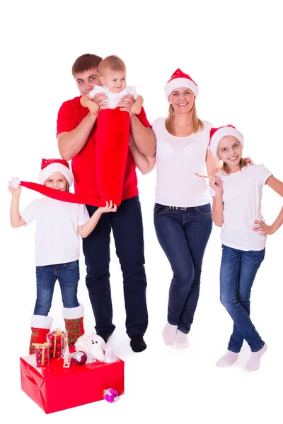 Happy cute family in santa's hats — Stock Photo, Image