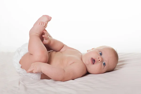 Cute happy baby in diaper — Stock Photo, Image