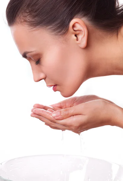 Beautiful young girl woman washing up face Royalty Free Stock Photos