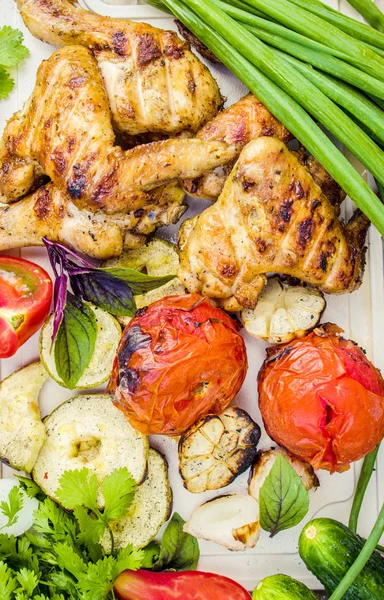 Vegetables and grilled chicken with greens — Stock Photo, Image