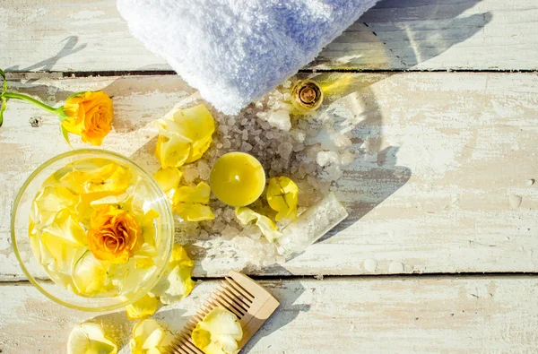 Spa composition of candles, bath salt and roses — Stock Photo, Image