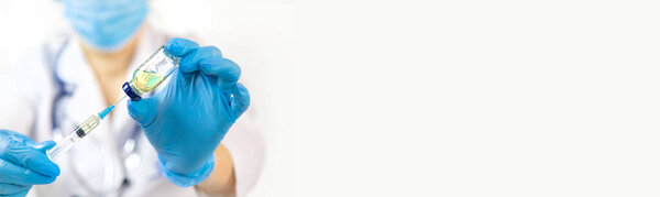 Doctor filling syringe with medication, closeup. Vaccination and immunization. Selective focus. Vaccine.
