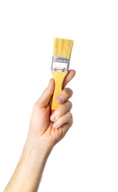 Erkek izolasyonun ellerinde tamir fırçası. Seçici odaklanma. İnsanlar.